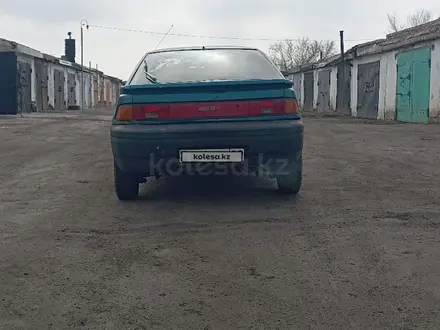 Mazda 323 1993 года за 880 000 тг. в Караганда – фото 2