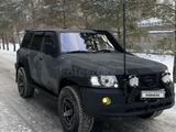 Nissan Patrol 2008 года за 22 000 000 тг. в Караганда – фото 3