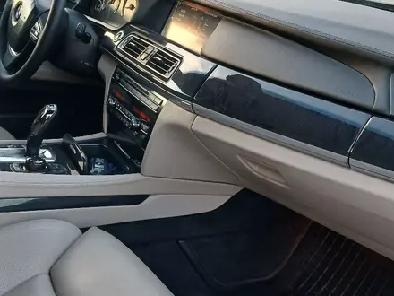 BMW 750 2009 года за 8 600 000 тг. в Астана – фото 13