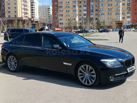 BMW 750 2009 года за 8 600 000 тг. в Астана – фото 19