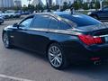 BMW 750 2009 года за 8 600 000 тг. в Астана – фото 25