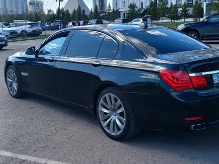 BMW 750 2009 года за 8 600 000 тг. в Астана – фото 25