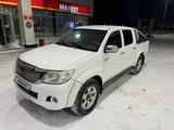 Toyota Hilux 2013 годаүшін7 500 000 тг. в Караганда