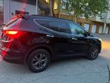 Hyundai Santa Fe 2013 года за 8 800 000 тг. в Актобе – фото 5