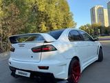 Mitsubishi Lancer 2010 года за 4 700 000 тг. в Астана – фото 2