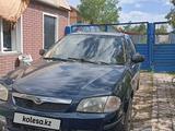 Mazda 323 1998 годаүшін1 700 000 тг. в Караганда – фото 2