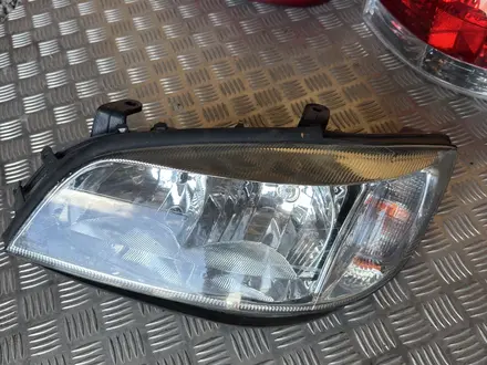 Передняя Фара Opel Zafira A за 2 777 тг. в Актобе