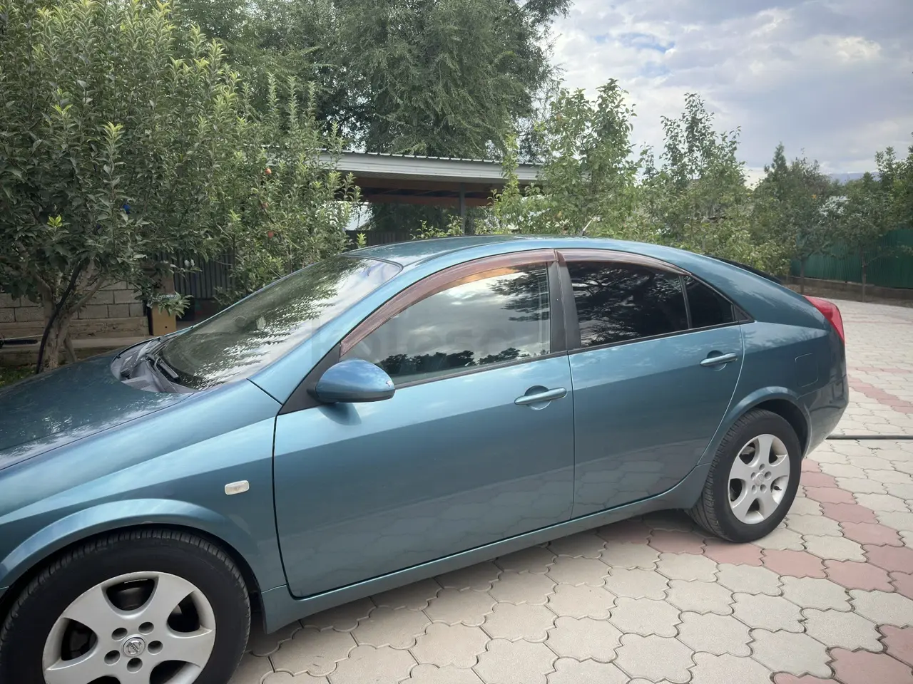 Nissan Primera, 2004