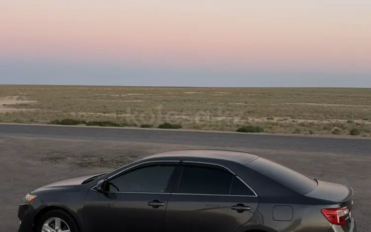 Toyota Camry 2014 года за 7 350 000 тг. в Жанаозен