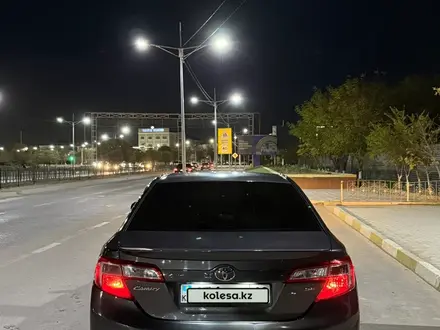 Toyota Camry 2014 года за 7 350 000 тг. в Жанаозен – фото 10