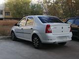 Renault Logan 2013 года за 2 350 000 тг. в Уральск – фото 2