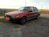 Mitsubishi Lancer 1989 годаfor450 000 тг. в Аксу