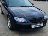 Mazda 323 2002 года за 2 300 000 тг. в Караганда – фото 2