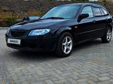 Mazda 323 2002 года за 2 300 000 тг. в Караганда – фото 3