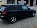 Mazda 323 2002 года за 2 300 000 тг. в Караганда – фото 4