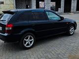 Mazda 323 2002 года за 2 300 000 тг. в Караганда – фото 4