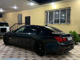 BMW 750 2010 года за 18 000 000 тг. в Алматы – фото 4