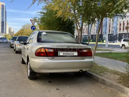 Mazda 323 1995 года за 2 000 000 тг. в Астана – фото 2