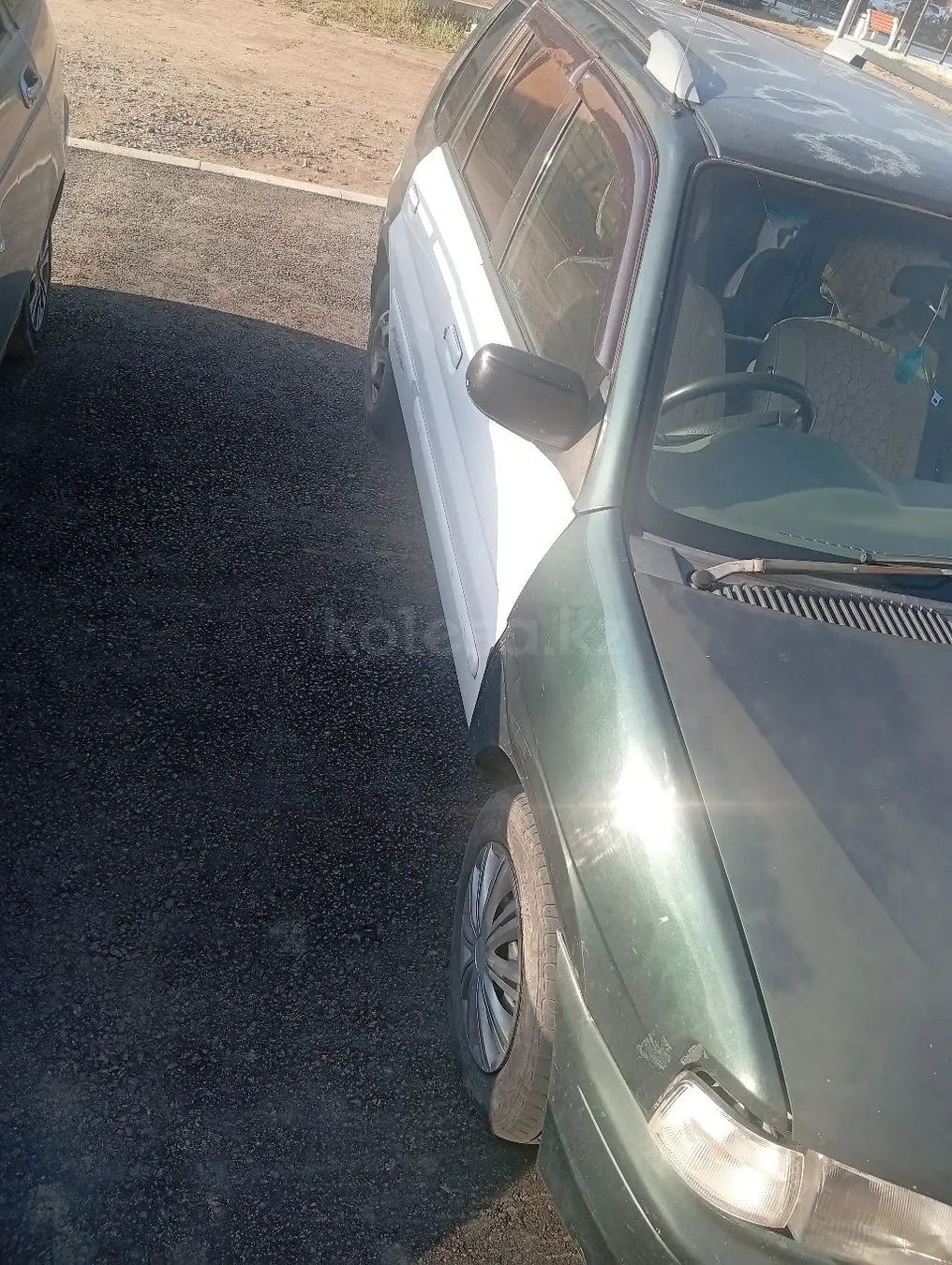 Mazda Demio, 1998
