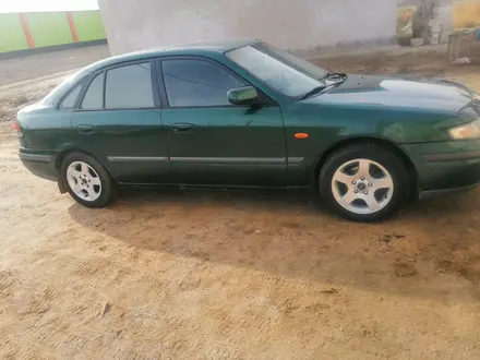 Mazda 626 1998 года за 2 300 000 тг. в Кызылорда – фото 4