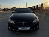 Toyota Camry 2013 года за 7 800 000 тг. в Жанаозен