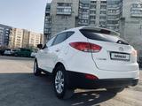 Hyundai Tucson 2012 годаүшін8 100 000 тг. в Караганда – фото 4