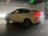 BMW X6 2021 года за 44 800 000 тг. в Алматы – фото 2