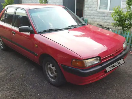 Mazda 323 1992 года за 734 561 тг. в Алматы – фото 2