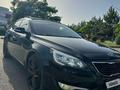 Kia K7 2012 года за 7 000 000 тг. в Талдыкорган – фото 3