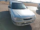 Mazda 323 1999 года за 2 000 000 тг. в Актобе – фото 2