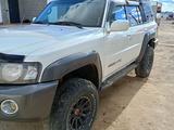 Nissan Patrol 2005 годаүшін13 500 000 тг. в Айтеке би