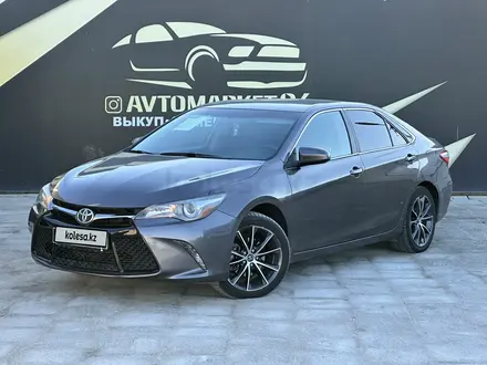 Toyota Camry 2015 года за 9 500 000 тг. в Атырау