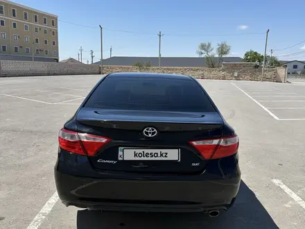 Toyota Camry 2015 года за 7 800 000 тг. в Жанаозен – фото 4