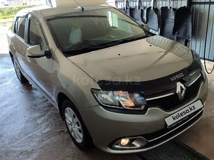 Renault Logan 2015 года за 3 500 000 тг. в Актобе – фото 2