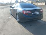 Toyota Camry 2012 года за 7 500 000 тг. в Атырау – фото 2