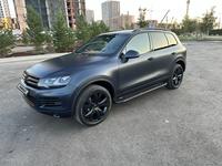 Volkswagen Touareg 2012 года за 10 400 000 тг. в Астана