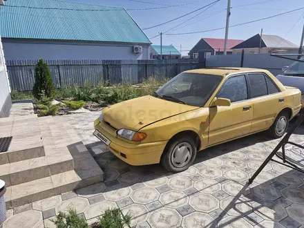 Mazda 323 1992 года за 500 000 тг. в Уральск – фото 2