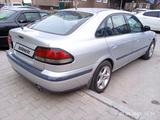 Mazda 626 1997 года за 1 900 000 тг. в Шымкент – фото 3