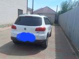 Volkswagen Tiguan 2015 года за 7 750 000 тг. в Актобе – фото 2