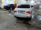 Nissan Almera 2013 года за 2 000 000 тг. в Астана – фото 2