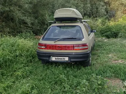 Mazda 323 1992 года за 900 000 тг. в Алматы – фото 4