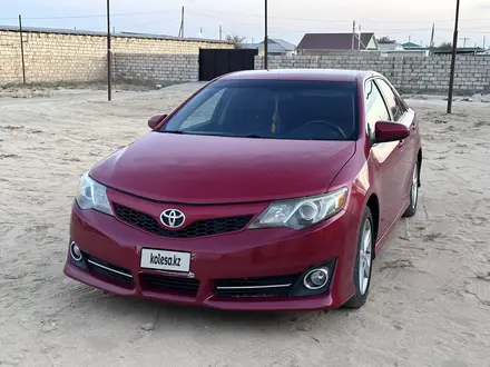 Toyota Camry 2013 года за 5 700 000 тг. в Жанаозен