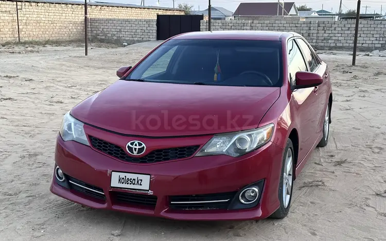 Toyota Camry 2013 года за 5 700 000 тг. в Жанаозен