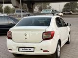 Renault Logan 2021 года за 2 690 000 тг. в Алматы – фото 4