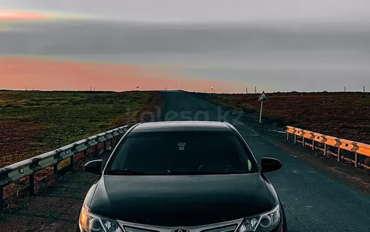 Toyota Camry 2014 года за 9 100 000 тг. в Атырау