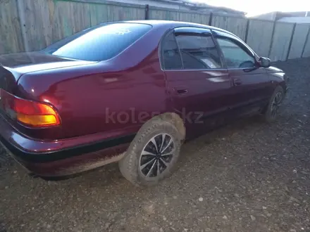 Toyota Carina E 1997 года за 2 000 000 тг. в Астана – фото 2