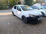 Renault Logan 2015 года за 2 700 000 тг. в Уральск – фото 2