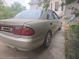Mazda 323 1995 года за 650 000 тг. в Шымкент – фото 4