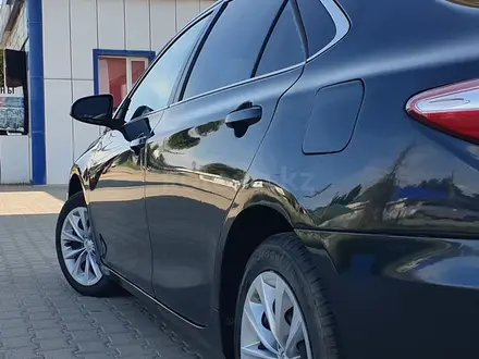 Toyota Camry 2015 года за 6 500 000 тг. в Актобе – фото 6