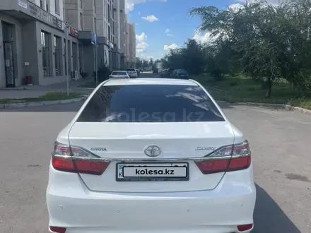 Toyota Camry 2015 года за 9 700 000 тг. в Астана – фото 4